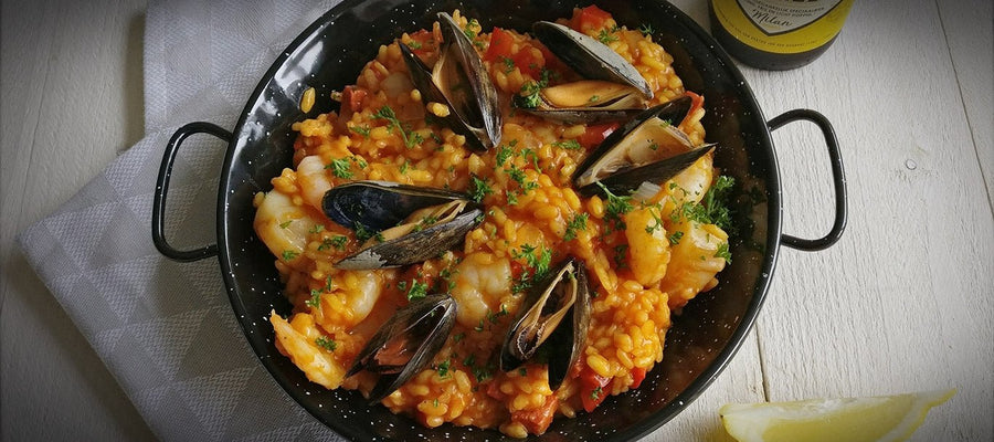 Paëlla met gamba's, coquilles en mosselen en Hertog Jan Hoppig Blond